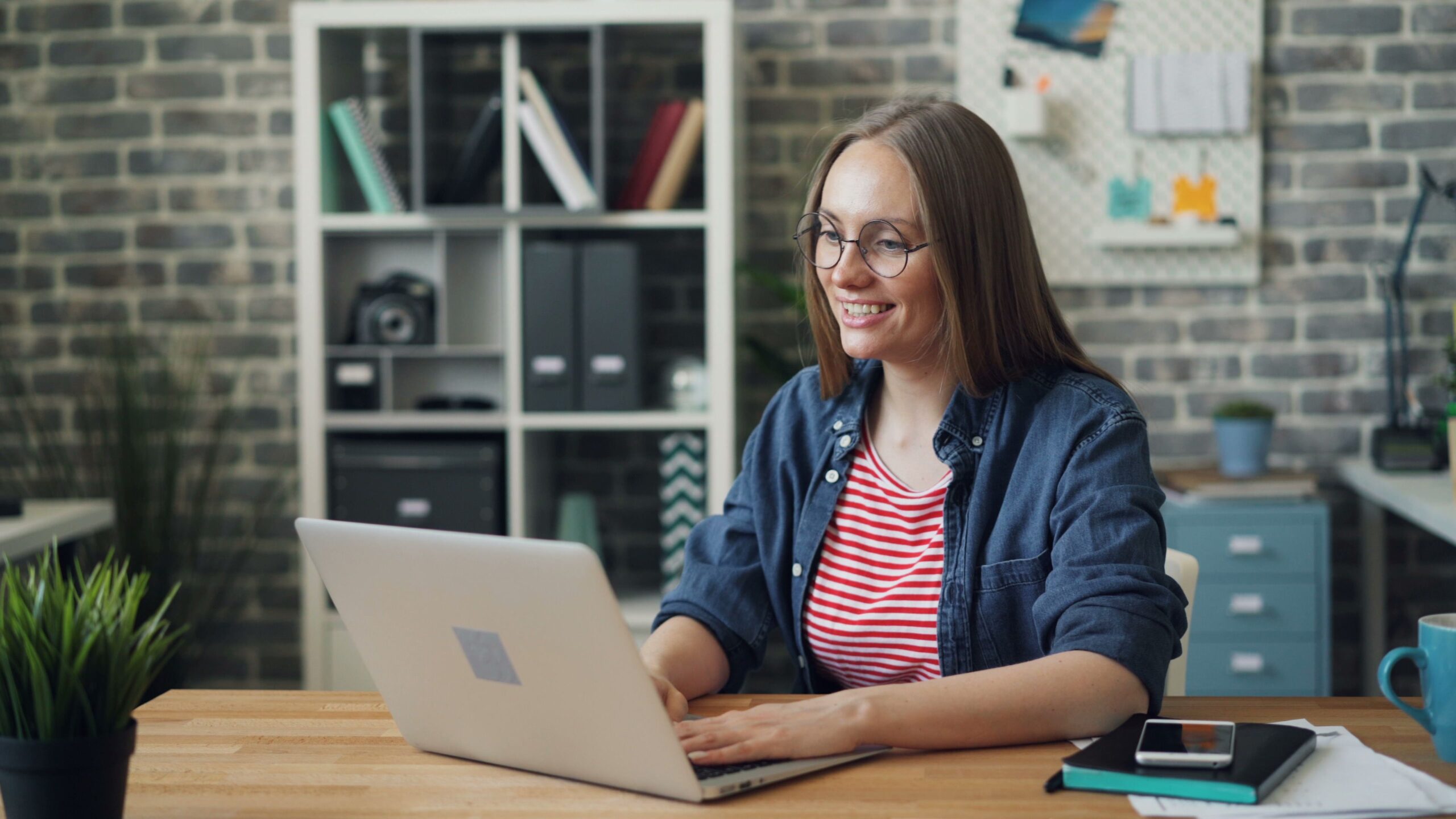 A person reviewing therapy coverage details on a laptop, looking reassured